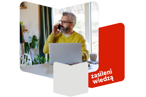 kobieta w garażu wyciąga zakupy z samochodu elektrycznego, w tle magazyn energii i stacja ładowania samochodó elektrycznych